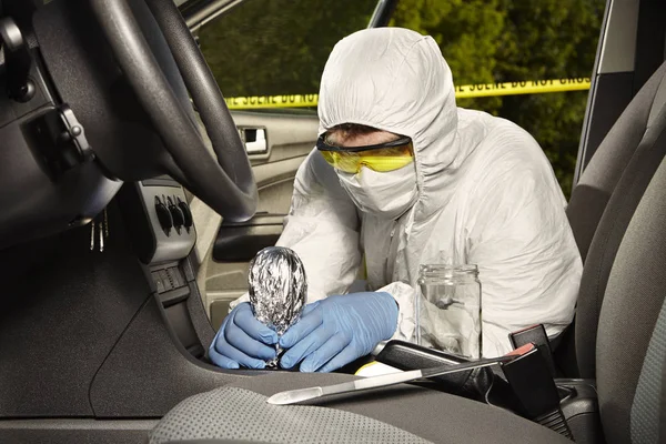 Collecting of odor traces by criminologist technician from gear shift — Stock Photo, Image