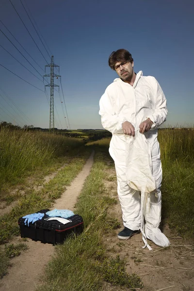 Police technician wearing DNA free overall and protective equipment — Stock Photo, Image