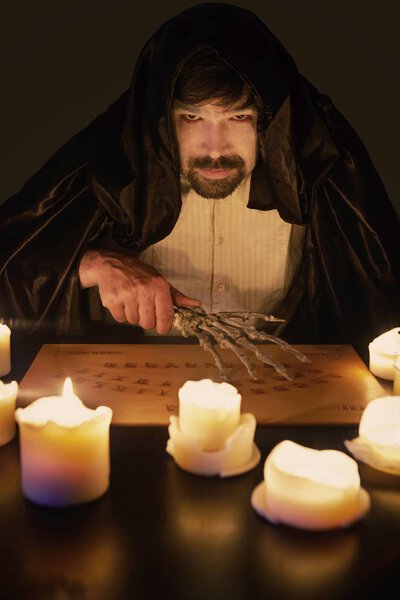 Spiritualist trying to make connection with ghosts