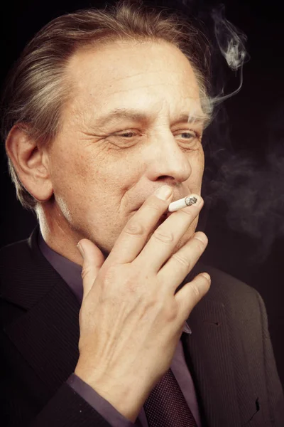Older Caucasian Man Enjoying Cigarette Black Background — Stock Photo, Image