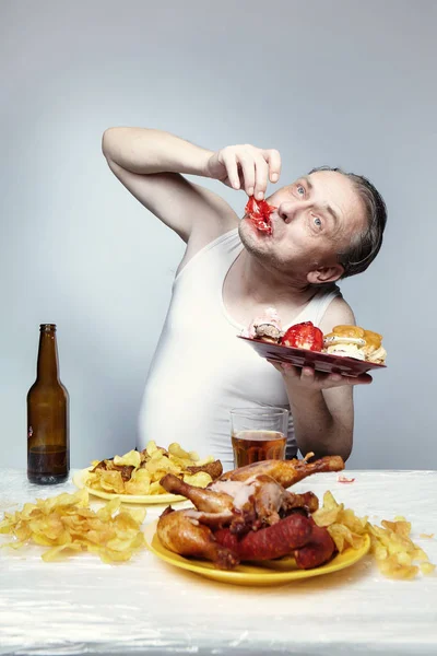 Aging Man Shirt Eating Lot Unhealthy Food — Stock Photo, Image