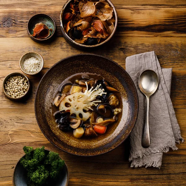 Healing Soup with roots, mushrooms and barley on wooden table background — Stock Image Healing Soup Roots Mushrooms Barley Wooden Table Background Stock Photo
