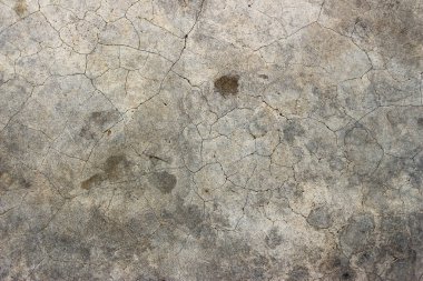 Yaş olarak çatlamış beton alçı duvar arkaplanı ve doku biçimi