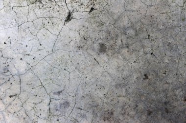 Yaş olarak çatlamış beton alçı duvar arkaplanı ve doku biçimi