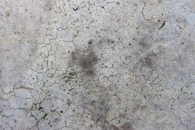 Yaş olarak çatlamış beton alçı duvar arkaplanı ve doku biçimi