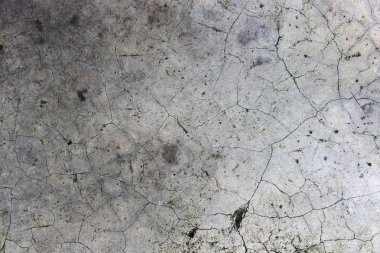 Yaş olarak çatlamış beton alçı duvar arkaplanı ve doku biçimi