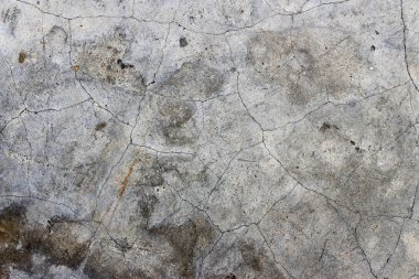 Yaş olarak çatlamış beton alçı duvar arkaplanı ve doku biçimi