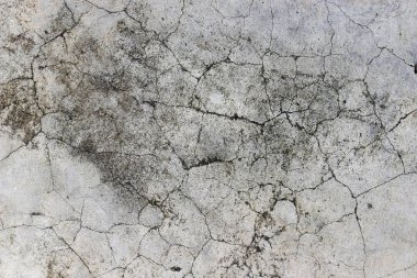 Yaş olarak çatlamış beton alçı duvar arkaplanı ve doku biçimi