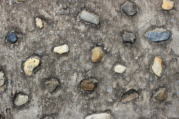 Wall round stone pebble rock texture background — Stock Photo, Image