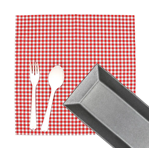 Top view plate with fork and spoon on tablecloth for food servin — Stock Photo, Image