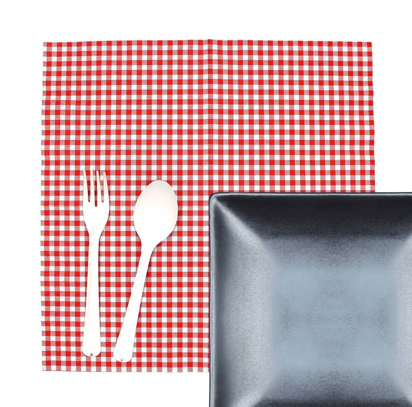 Piatto vista dall'alto con forchetta e cucchiaio su tovaglia per servire il cibo — Foto Stock
