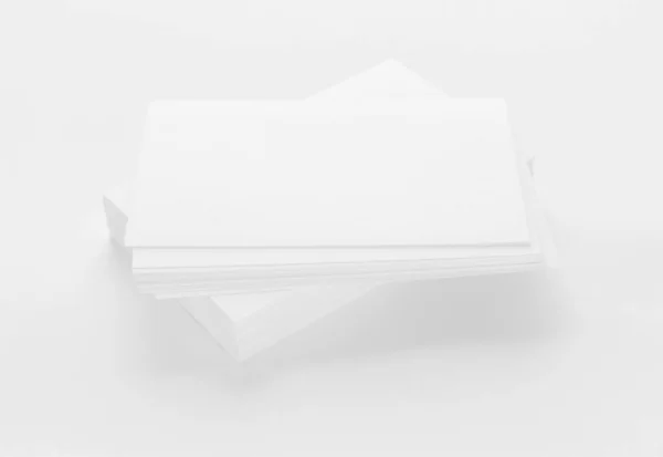 Mockup de cartões de visita sobre fundo de papel texturizado branco — Fotografia de Stock