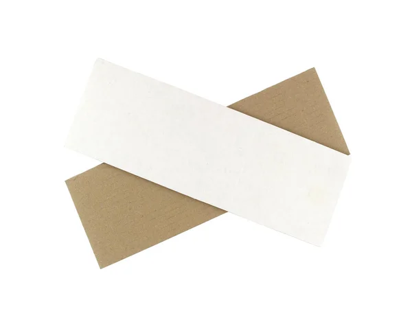 Reciclado marrón rasgado o desgarrado piezas de papel artesanal palo en una w — Foto de Stock