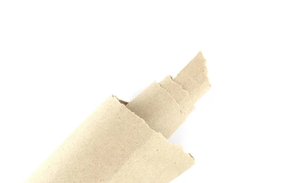 Riciclato marrone strappato o strappato pezzi di bastone mestiere di carta su un w — Foto Stock