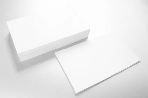 Download Mockup Of Business Cards On White Textured Paper Background Empty Sign Stock Photo 325296764