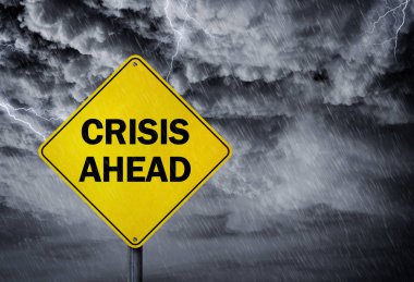 Crisis ahead sign in a rain storm clipart
