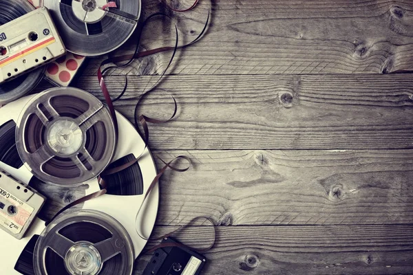 Retro audio reels and cassette tapes — Stock Photo, Image