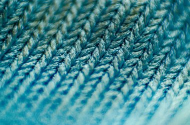 Kumaşın makro fotoğrafı. Kumaş malzemesinin dokusu çok güçlü bir yaklaşım. Kumaş dokusu arka planı. İyileşen dokuma