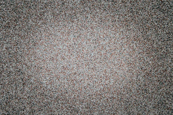 Background noise texture. Macro texture of stone chips. Sandpaper in macro. Effect applied