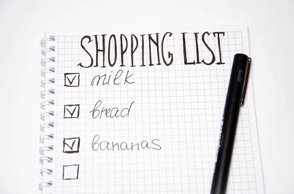 Shopping List Squared Notebook Black Pen White Background Record Ideas — Stock Photo, Image