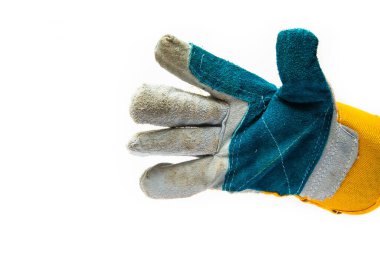 İşçiler için eldivenler, inşaat işçileri, toplayıcılar için. Beyaz arka planda kalın ve güçlü bir kumaştan erkek eldiveni. Eldivenler yakın plan