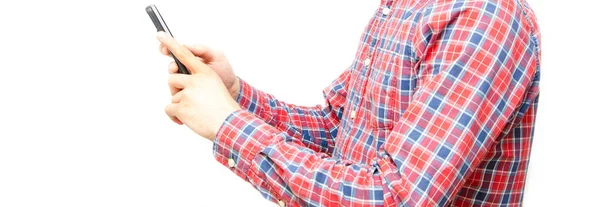 Young Man Plaid Shirt Smartphone White Background Guy Looks Smartphone — Stock Photo, Image