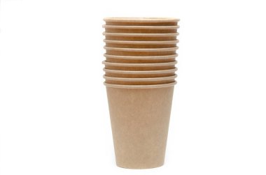 Brown paper cup for coffee, tea, a drink from environmental materials on a white background. Many cups in a one-on-one ass. A row of glasses up. Wide glasses, buckets