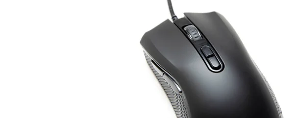 Black gaming mouse with side extra keys and a matte finish on white background. Mouse view from the back under the brush. The mouse in macro, the keys and the wheel are viewed from a person at an angle