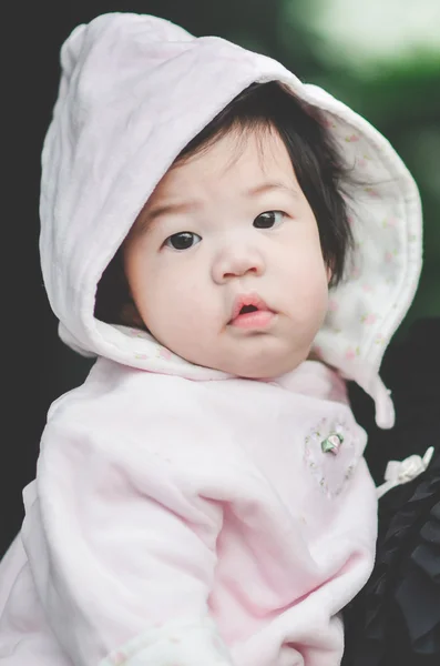 Close up of Asian baby in winter clothes, — Stock Photo, Image