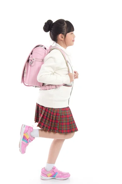 Criança asiática em uniforme escolar com saco escolar rosa — Fotografia de Stock