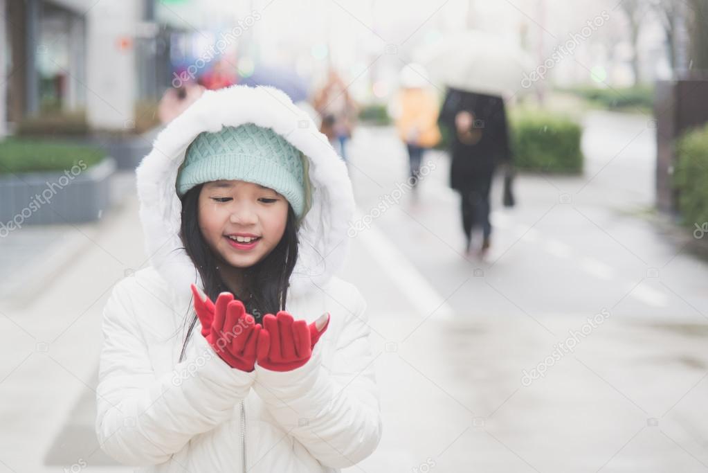 Girl in snow Asian