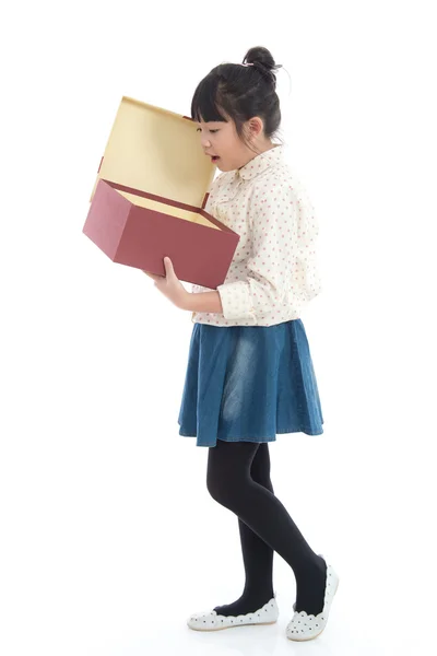 Asian girl opening gift present box on white background isolated — Stock Photo, Image