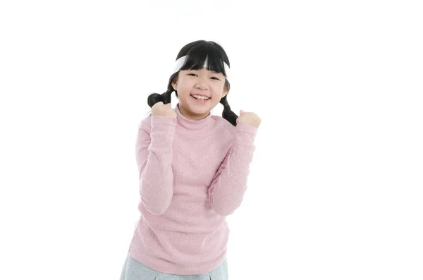 School girl showing success sign — Stock Photo, Image