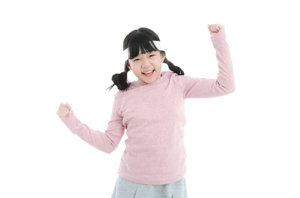 School girl showing success sign — Stock Photo, Image