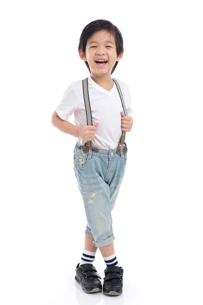 Lindo niño asiático en camiseta blanca y jeans — Foto de Stock