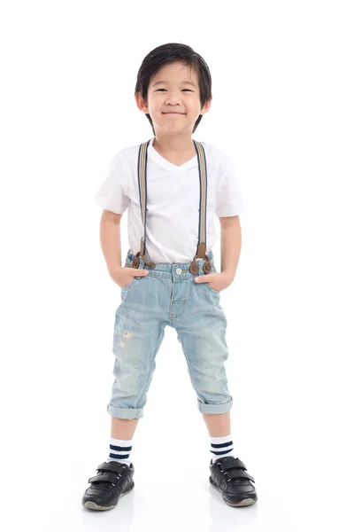 Lindo niño asiático en camiseta blanca y jeans —  Fotos de Stock