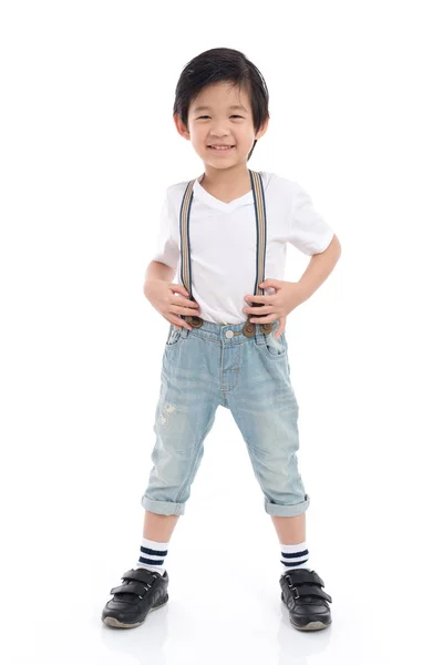 Lindo niño asiático en camiseta blanca y jeans —  Fotos de Stock