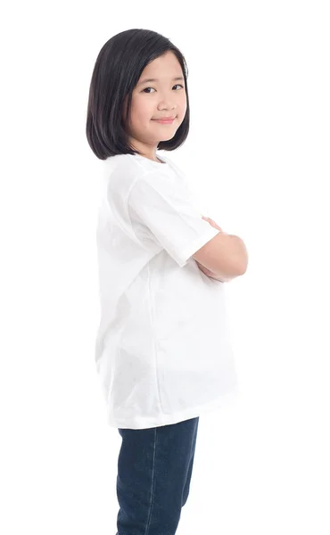 Söt asiatisk tjej i vit t-shirt och jeans står på vit bakgrund isolerade — Stockfoto