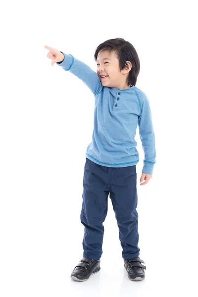 Asiático niño apuntando en blanco fondo aislado —  Fotos de Stock