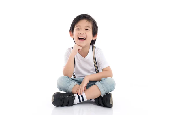 Asiático chico sentado en blanco fondo — Foto de Stock