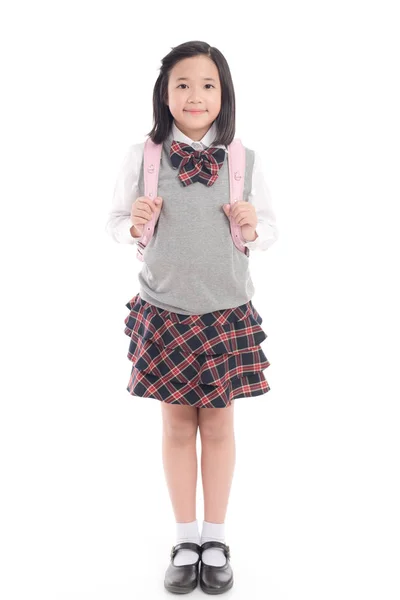 Asyalı çocuk okul pembe okul çantası ile üniforma — Stok fotoğraf