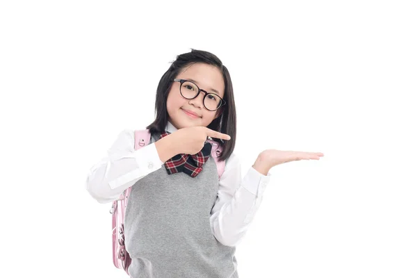 Asiatische Studentin zeigt auf offene Handfläche — Stockfoto