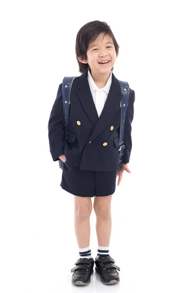 Asiatique enfant en uniforme scolaire avec sac d'école bleu — Photo