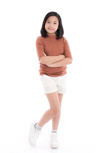 Aranyos ázsiai lány állt a fehér háttér — Stock Fotó