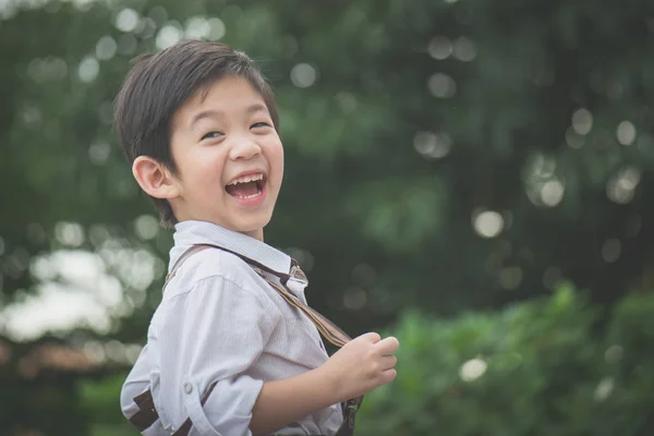 Happy asian child outdoor — Stock Photo, Image