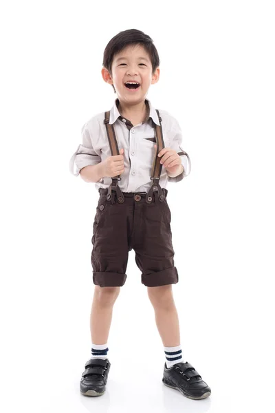 Asiático niño de pie sobre fondo blanco — Foto de Stock