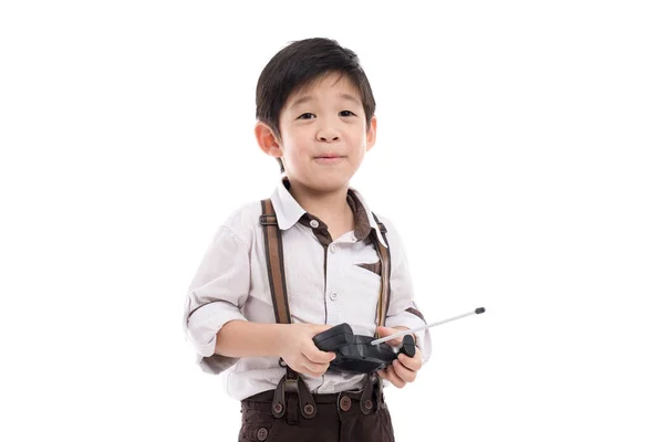 Niño sosteniendo control remoto de radio — Foto de Stock