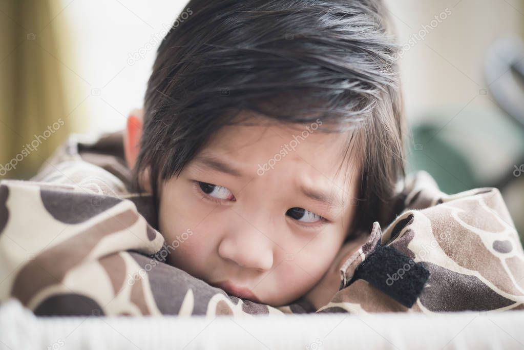 Close up of sad Asian child