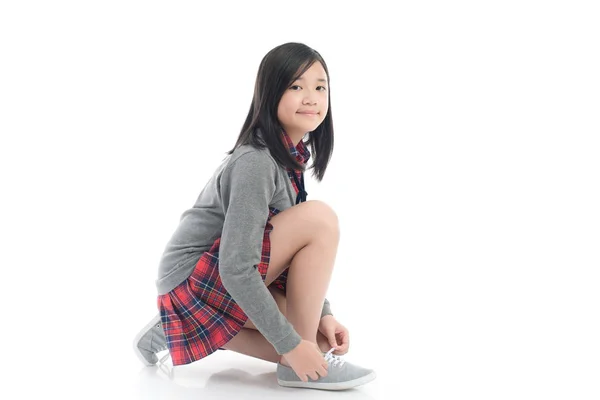Beautiful Asian Girl Tying Shoelaces White Background Isolated — Stock Photo, Image