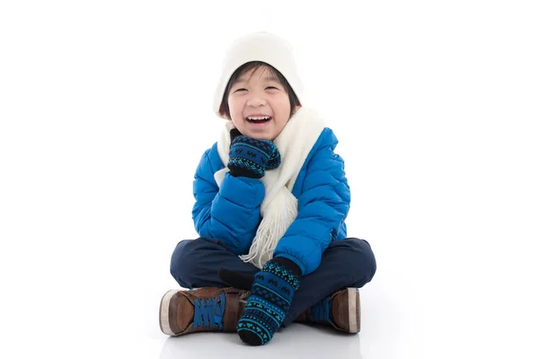 Happy Asian Child Blue Winter Clothes Sitting White Background Isolated — Stock Photo, Image